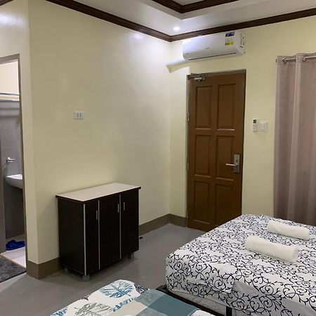 Zl Travelers Inn Batuan Buitenkant foto