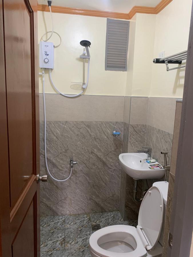 Zl Travelers Inn Batuan Buitenkant foto