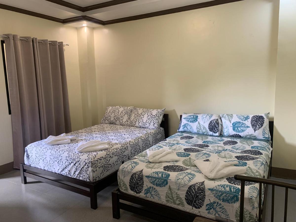 Zl Travelers Inn Batuan Buitenkant foto