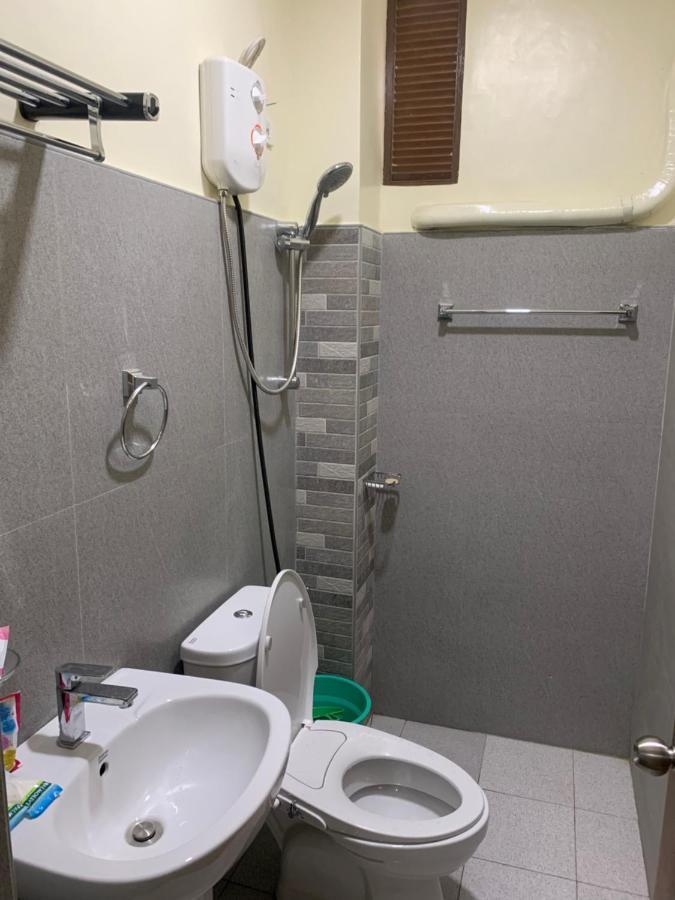 Zl Travelers Inn Batuan Buitenkant foto