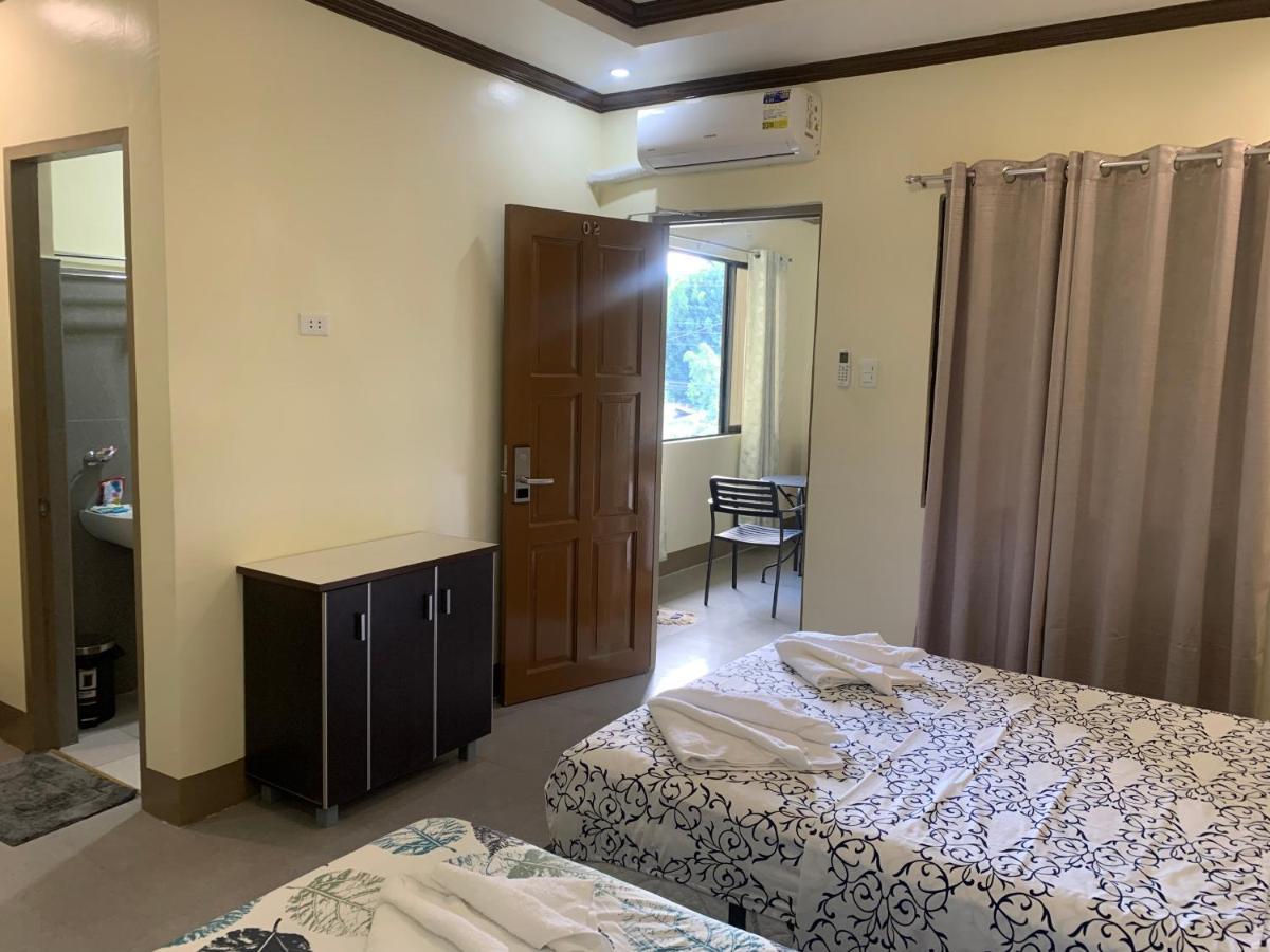 Zl Travelers Inn Batuan Buitenkant foto