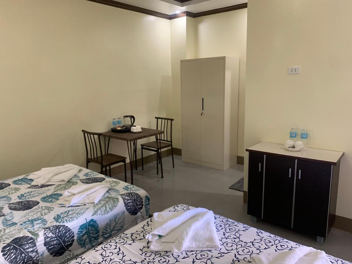 Zl Travelers Inn Batuan Buitenkant foto