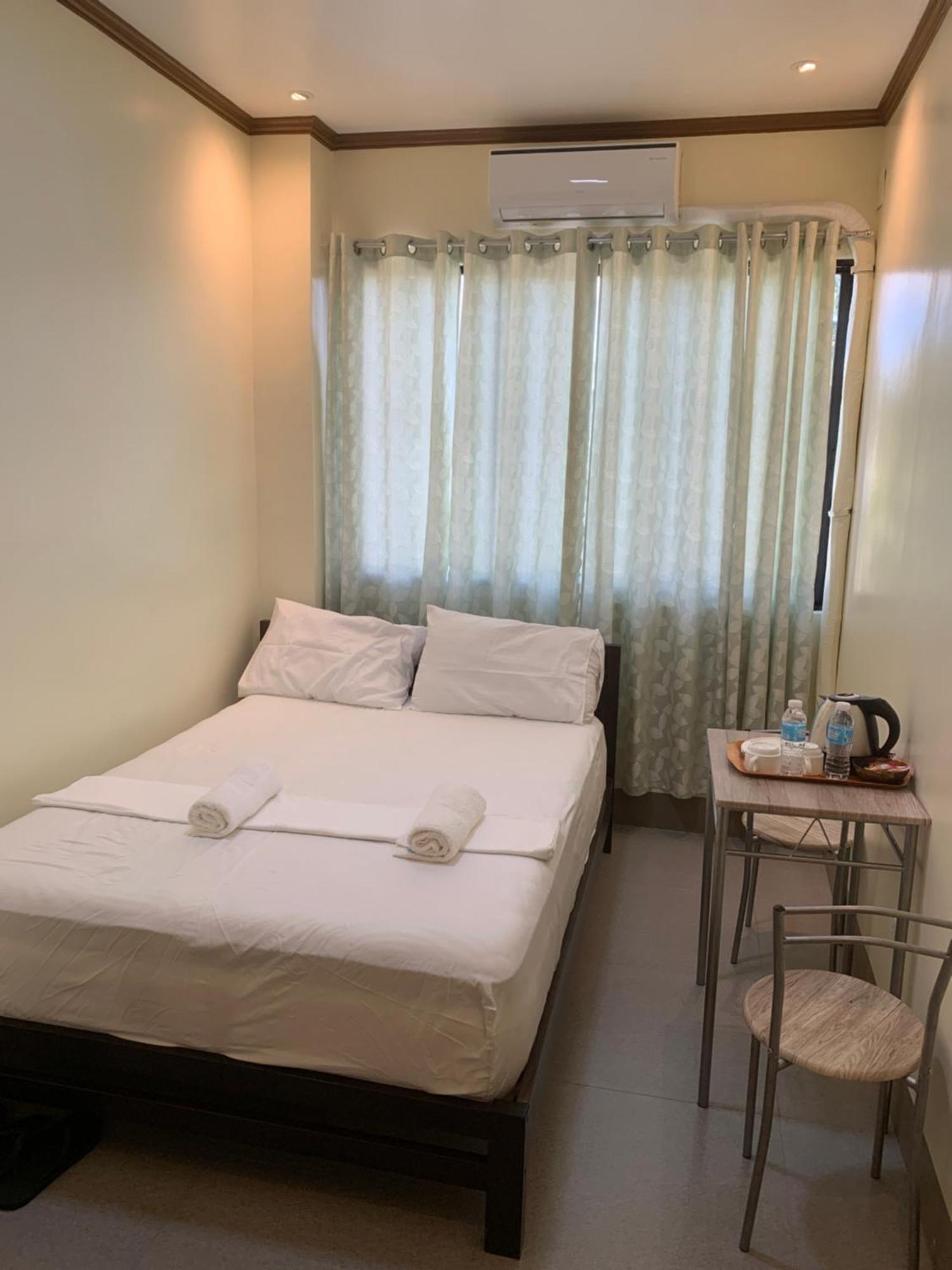 Zl Travelers Inn Batuan Buitenkant foto