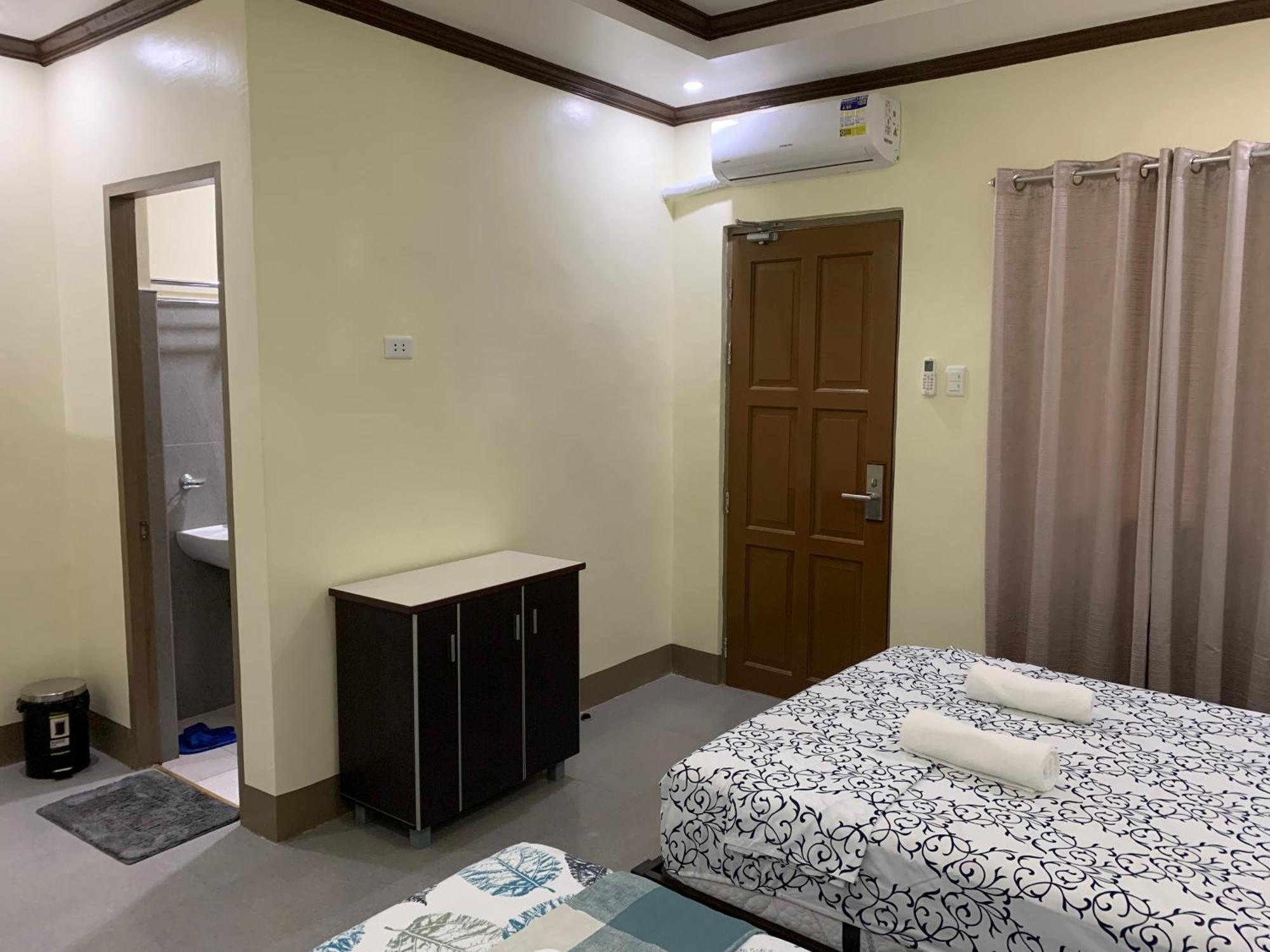 Zl Travelers Inn Batuan Buitenkant foto