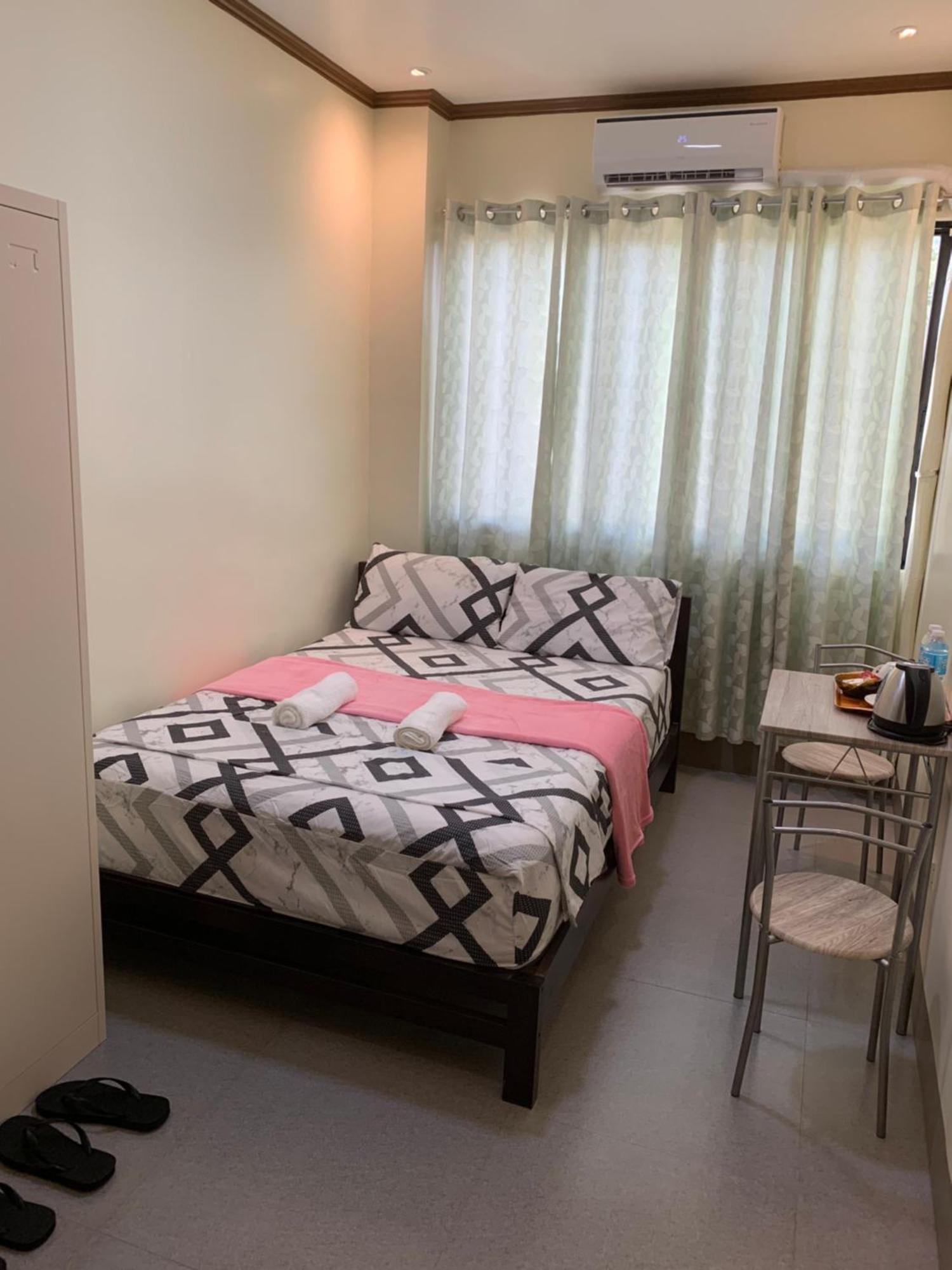 Zl Travelers Inn Batuan Buitenkant foto