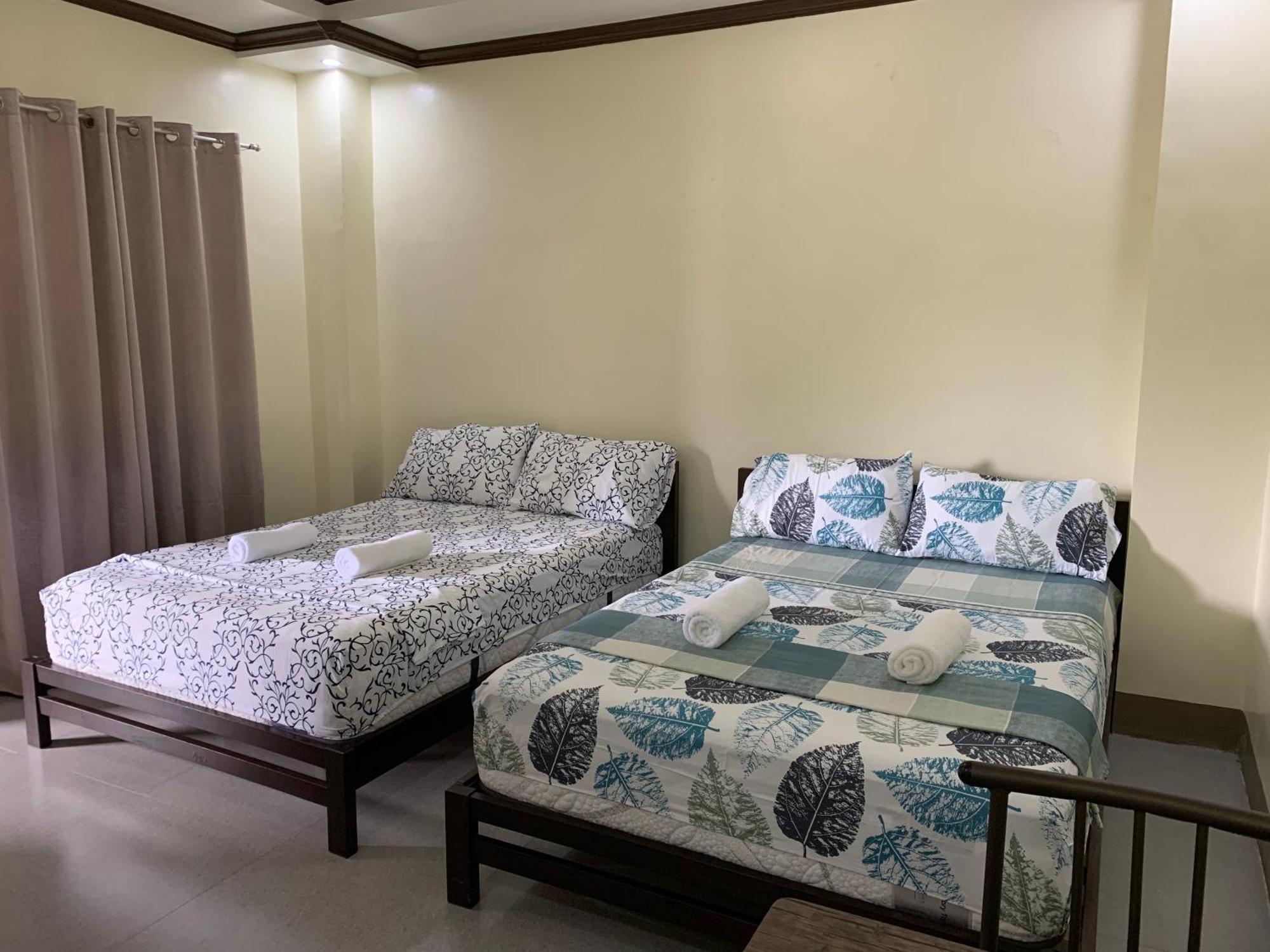Zl Travelers Inn Batuan Buitenkant foto