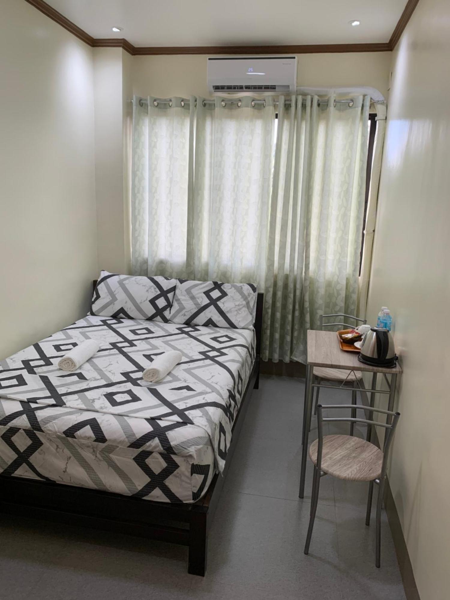 Zl Travelers Inn Batuan Buitenkant foto