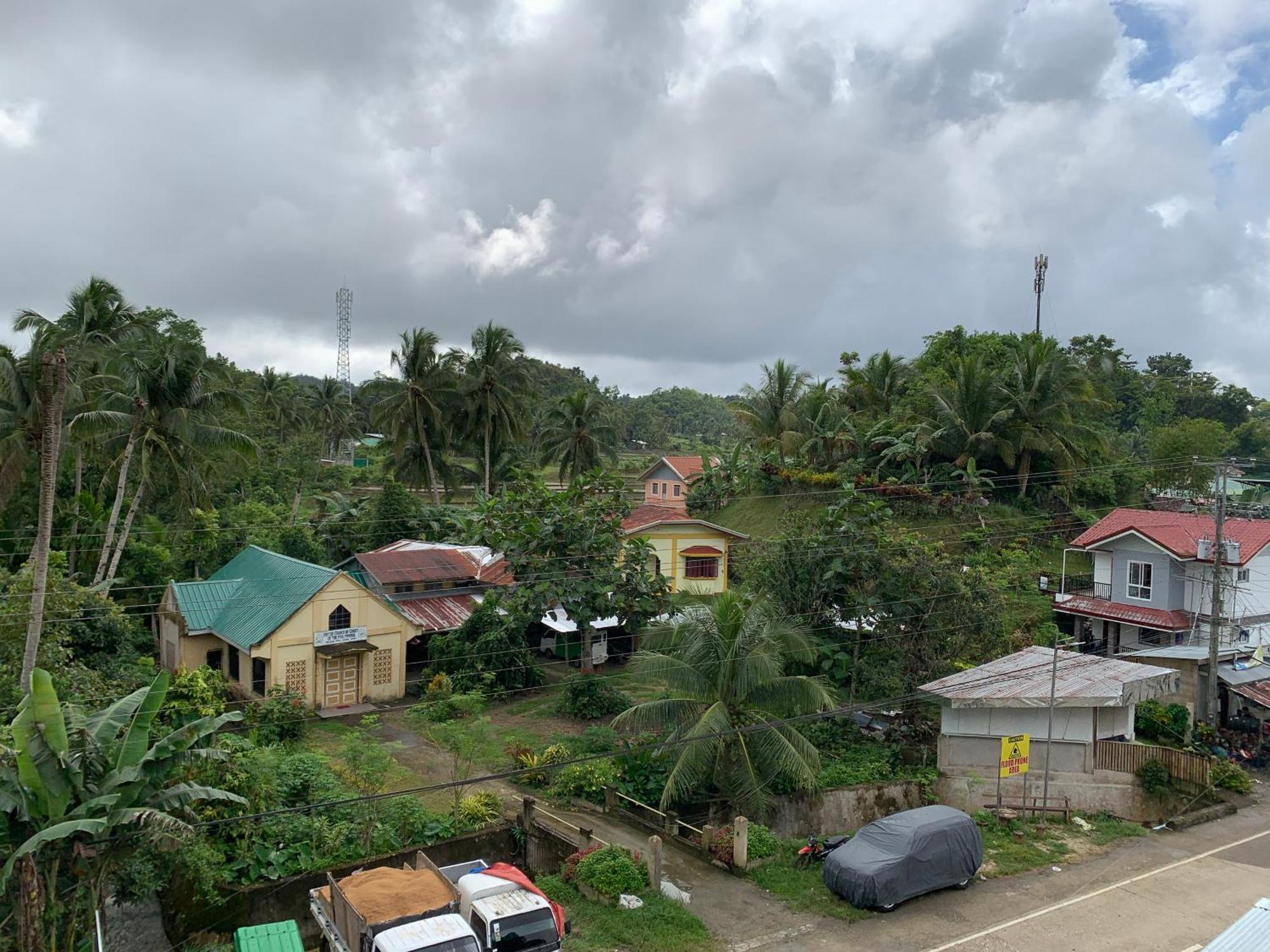 Zl Travelers Inn Batuan Buitenkant foto