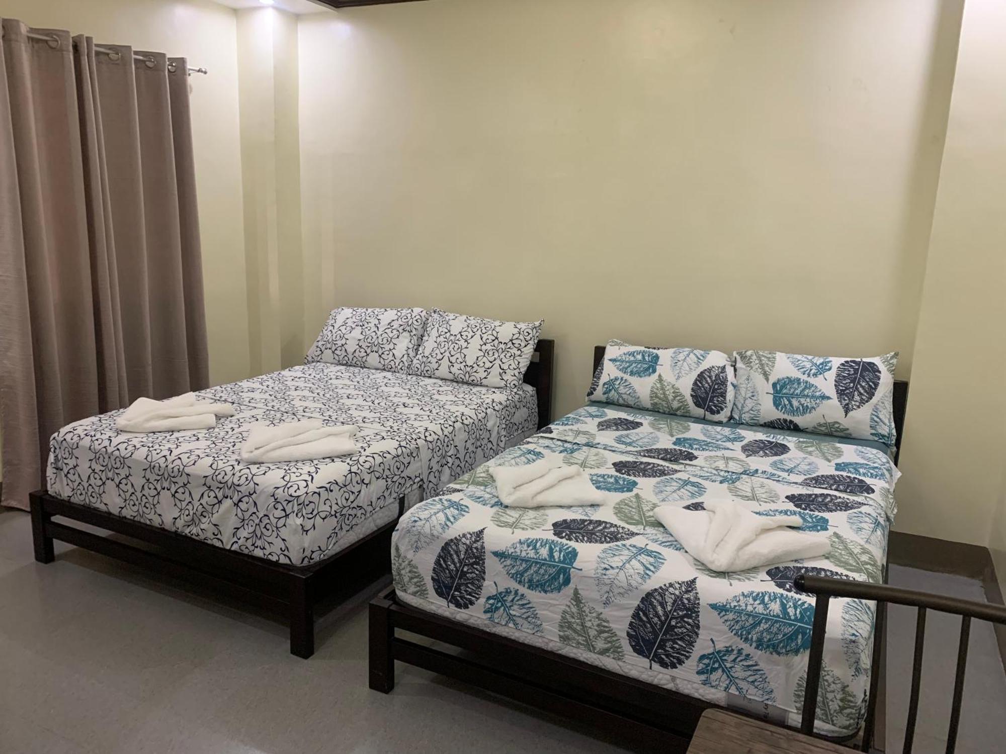 Zl Travelers Inn Batuan Buitenkant foto